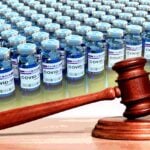 covid vaccines and gavel