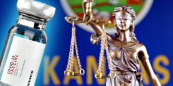 covid vaccine with kansas flag and lady justice