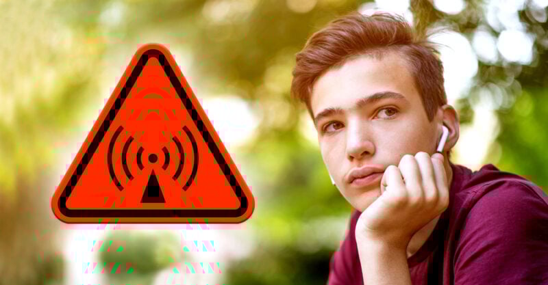 boy with apple airpod in ear and electromagnetic radiation symbol