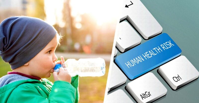 child drinking plastic water bottle