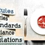 lab meat on a dinner plate and word "regulations"