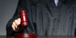 Photo of Judge holding Gavel.