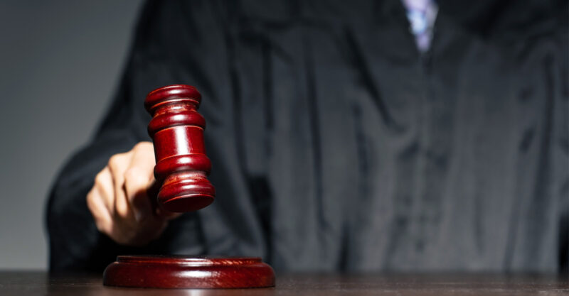 Photo of Judge holding Gavel.