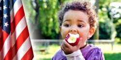 toddler eating an apple