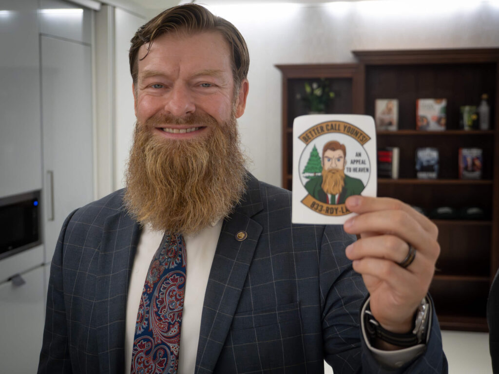 Man holding sticker