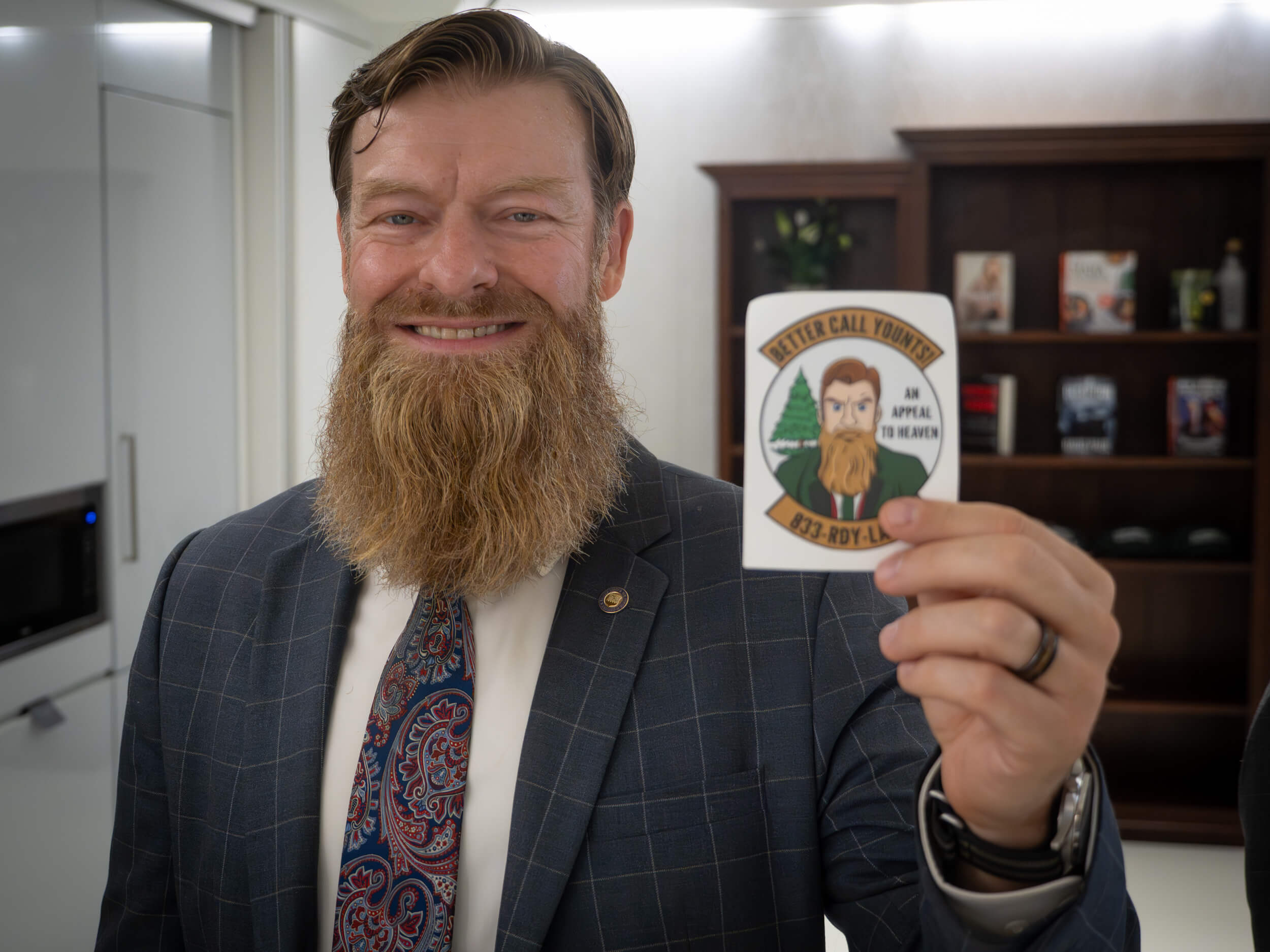 Man holding sticker
