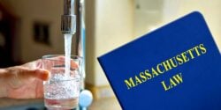 water faucet and book with words "Massachusetts law"