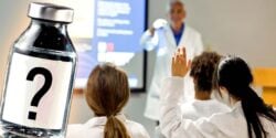 doctor teaching medical students and vaccine bottle
