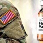 u.s. military uniform and flu vaccine bottle