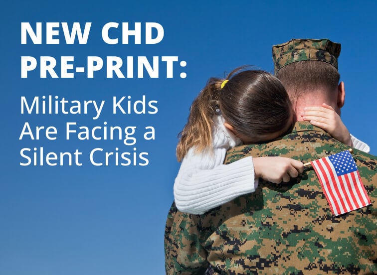 Military father holding child