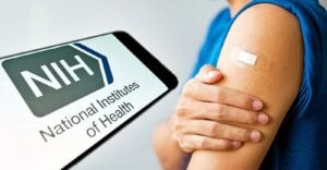 nih logo and bandage over vaccine site on a person's arm