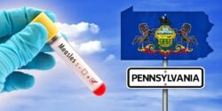 measles positive test and pennsylvania flag