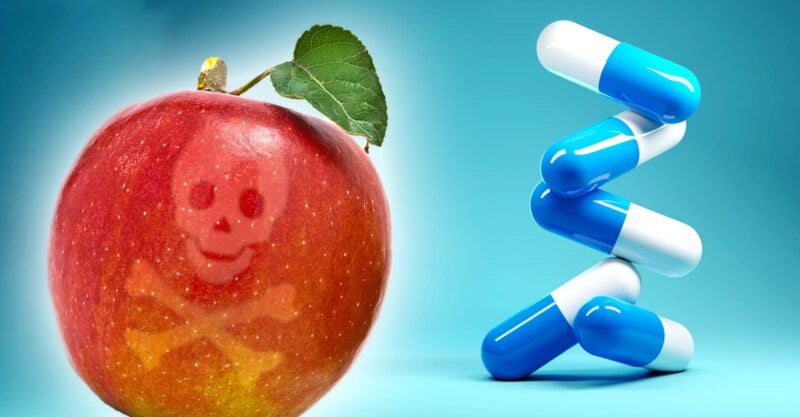 apple with poison symbol on it and antibiotics