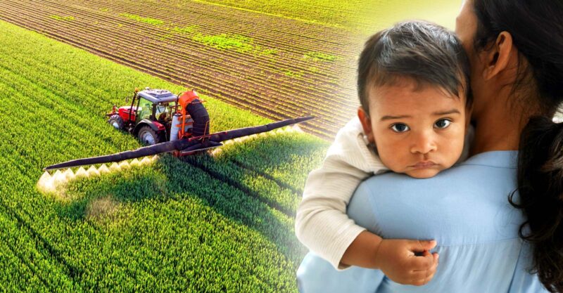 pesticide tractor and mom holding baby