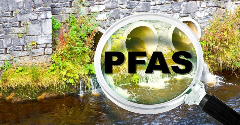 water and magnifying glass with "PFAS" inside