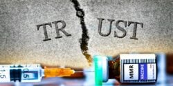 word "trust" and mmr vaccine bottle