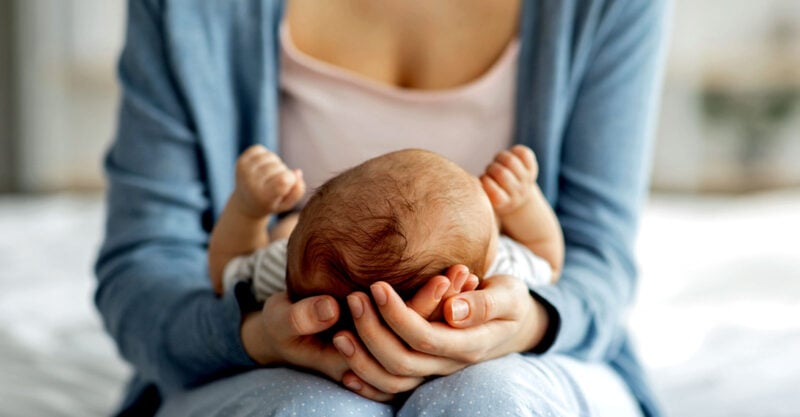 new mom holding baby