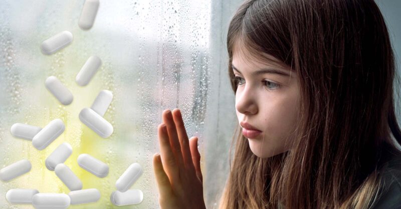 young girl and pills