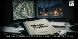 Image of computer on desk and a book with the title "Telecom Playbook"