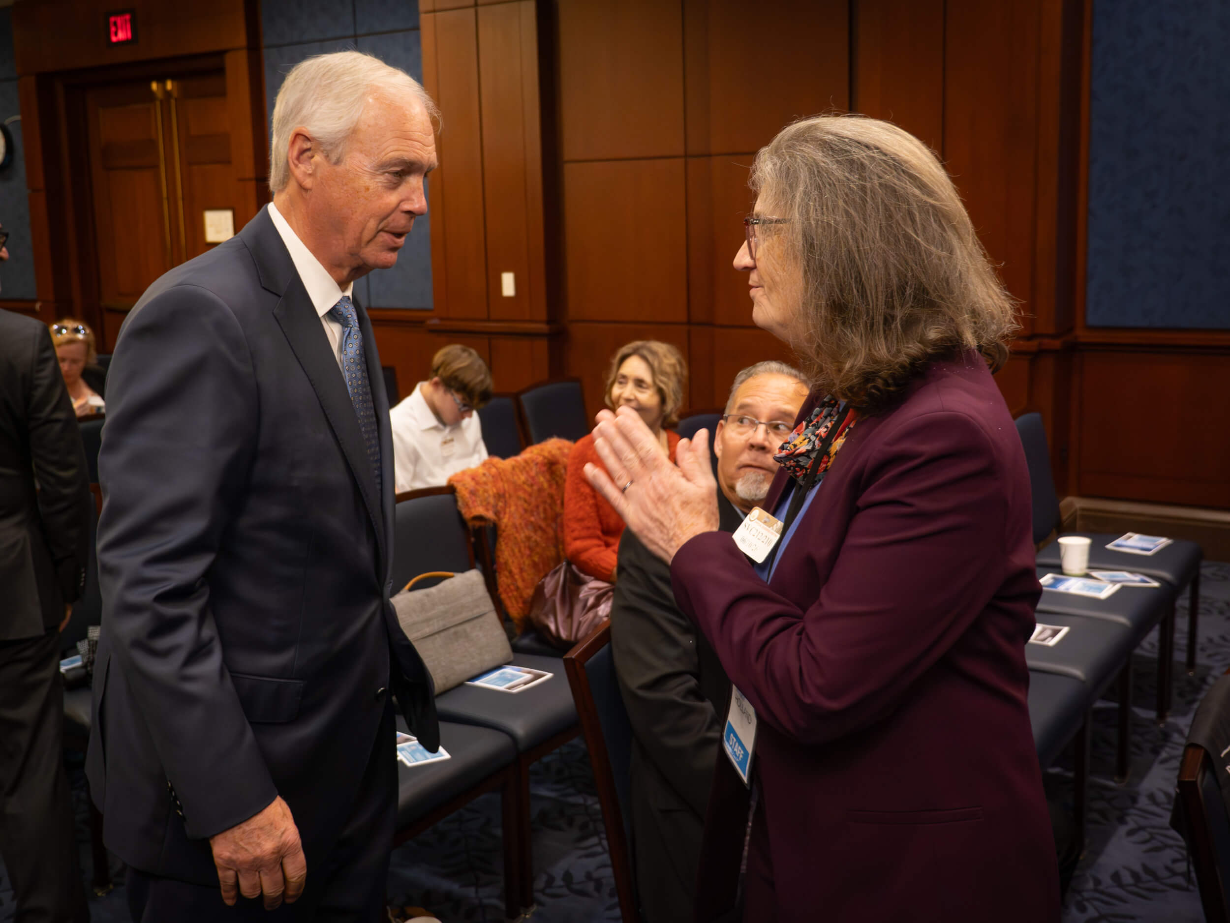Ron Johnson talking to Mary Holland