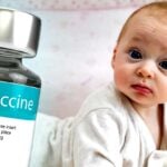 baby and vaccine bottle