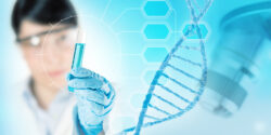 Woman holding vial with blue liquid, DNA strand
