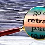 word "Retract" with papers
