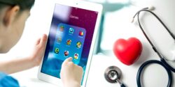 child using iPad and heart