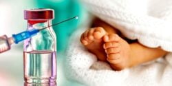 baby feet and vaccine bottle