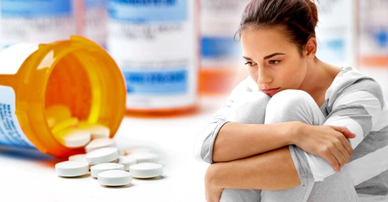 prescription pills and woman