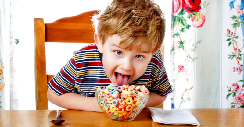 child eating sugar breakfast cereal