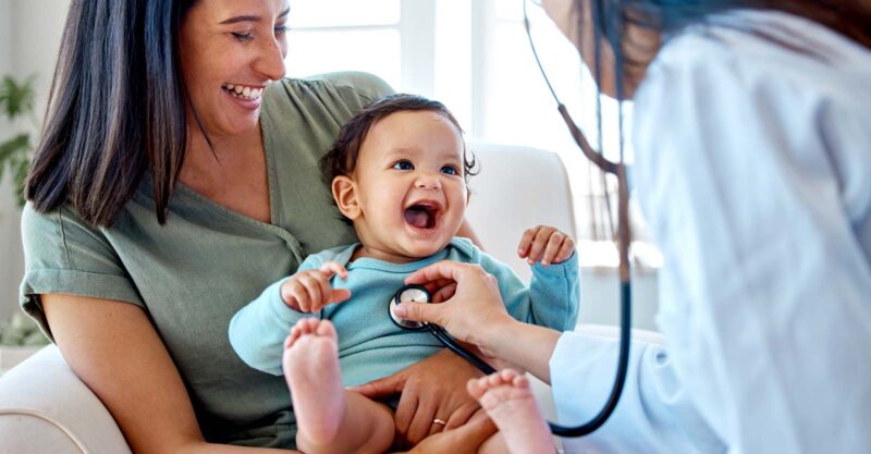doctor, mom and baby