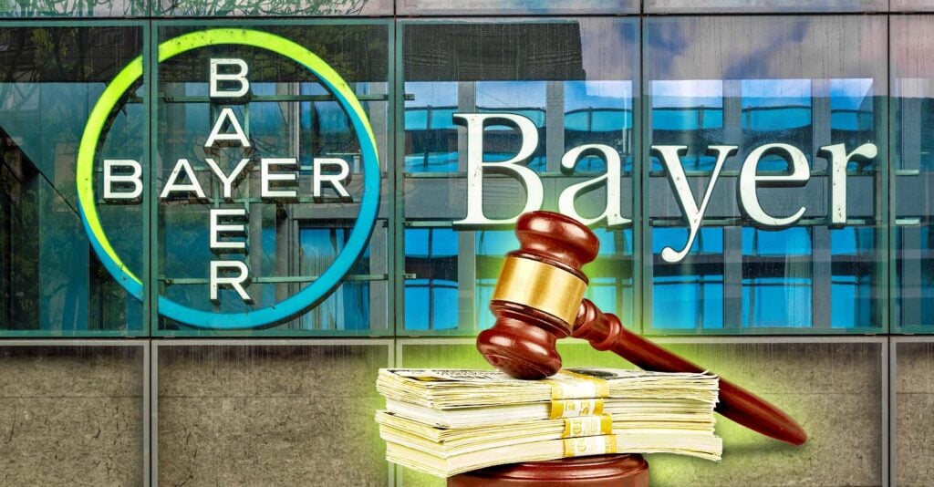 bayer building and gavel with cash