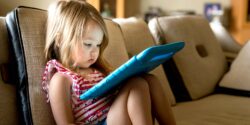 toddler using tablet