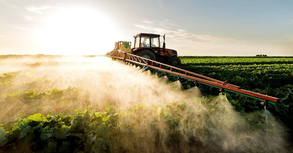 tractor spraying pesticides