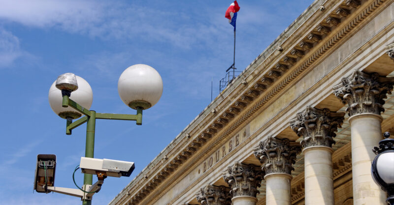 Surveillance cameras on pole at the Bourse in Paris France.
