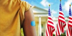 child with arm band aid and white house