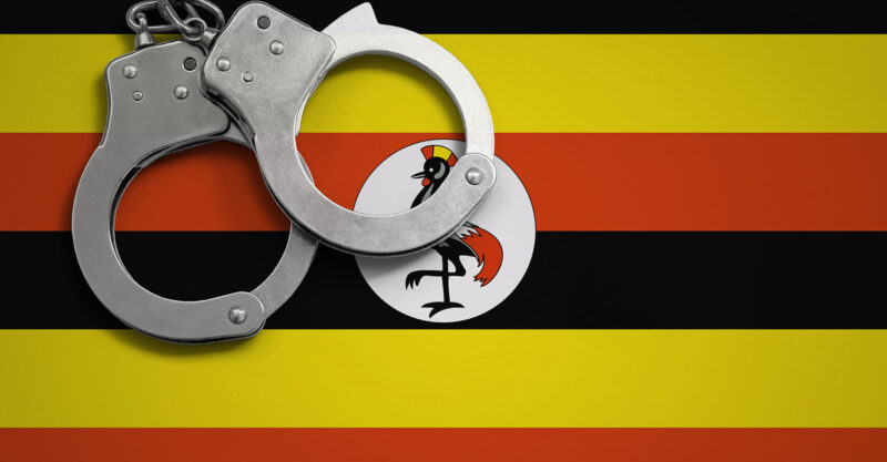 Flag of Uganda with handcuffs overlayed on top.