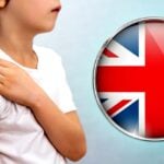 child getting vaccine and U.K. flag inside magnifying glass