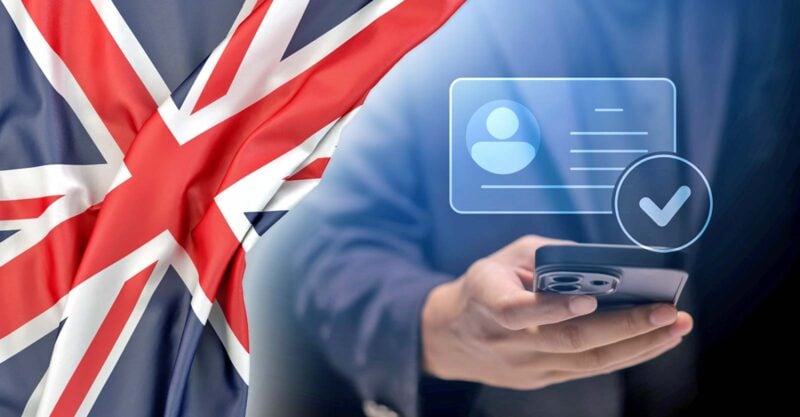 u.k. flag and man holding cellphone with digital id on it