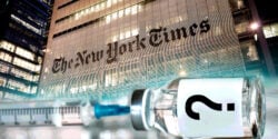 new york times building and vaccine bottle