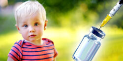 boy and vaccine bottle