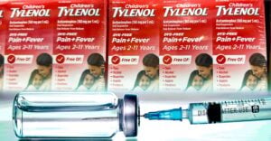 Tylenol bottles and vaccine bottle