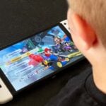 child playing on nintendo switch video game