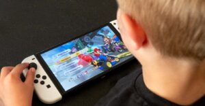 child playing on nintendo switch video game