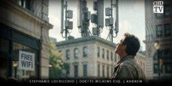 Image of man looking up to the sky with a cell tower in the background