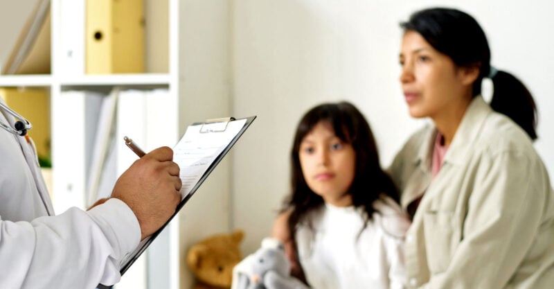 mom and daughter at doctor office
